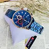 Reloj Curren